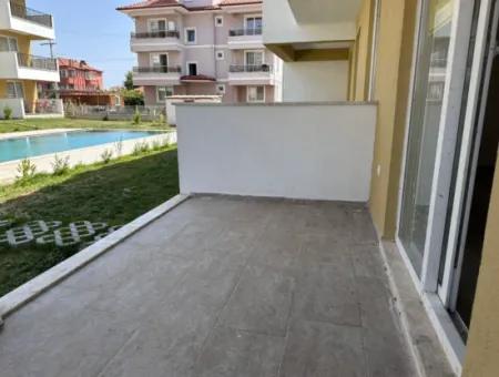 Ortaca Da 2 1 Schwimmbad Null Gartengeschoss Wohnung Zu Verkaufen