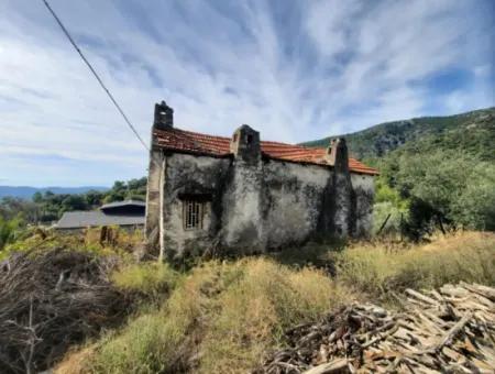 Göcek Gökçeovacıkta Satılık Deniz Manzaralı Ev Ve 246 M2 Arazisi