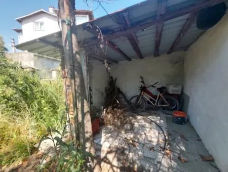 Muğla Köyceğiz Gülpınar’da Göl Yakını Bahçeli Kargir Köy Evi Satılık
