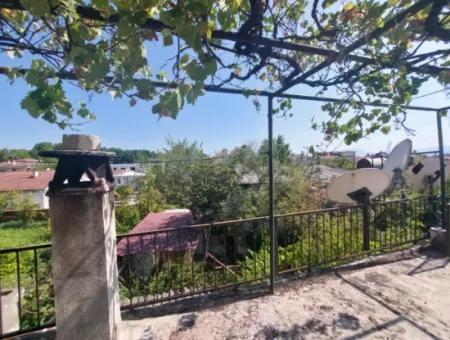 Muğla Köyceğiz Gülpınar’da Göl Yakını Bahçeli Kargir Köy Evi Satılık