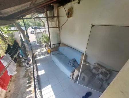 Muğla Köyceğiz Gülpınar’da Göl Yakını Bahçeli Kargir Köy Evi Satılık